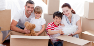 family moving home with boxes around